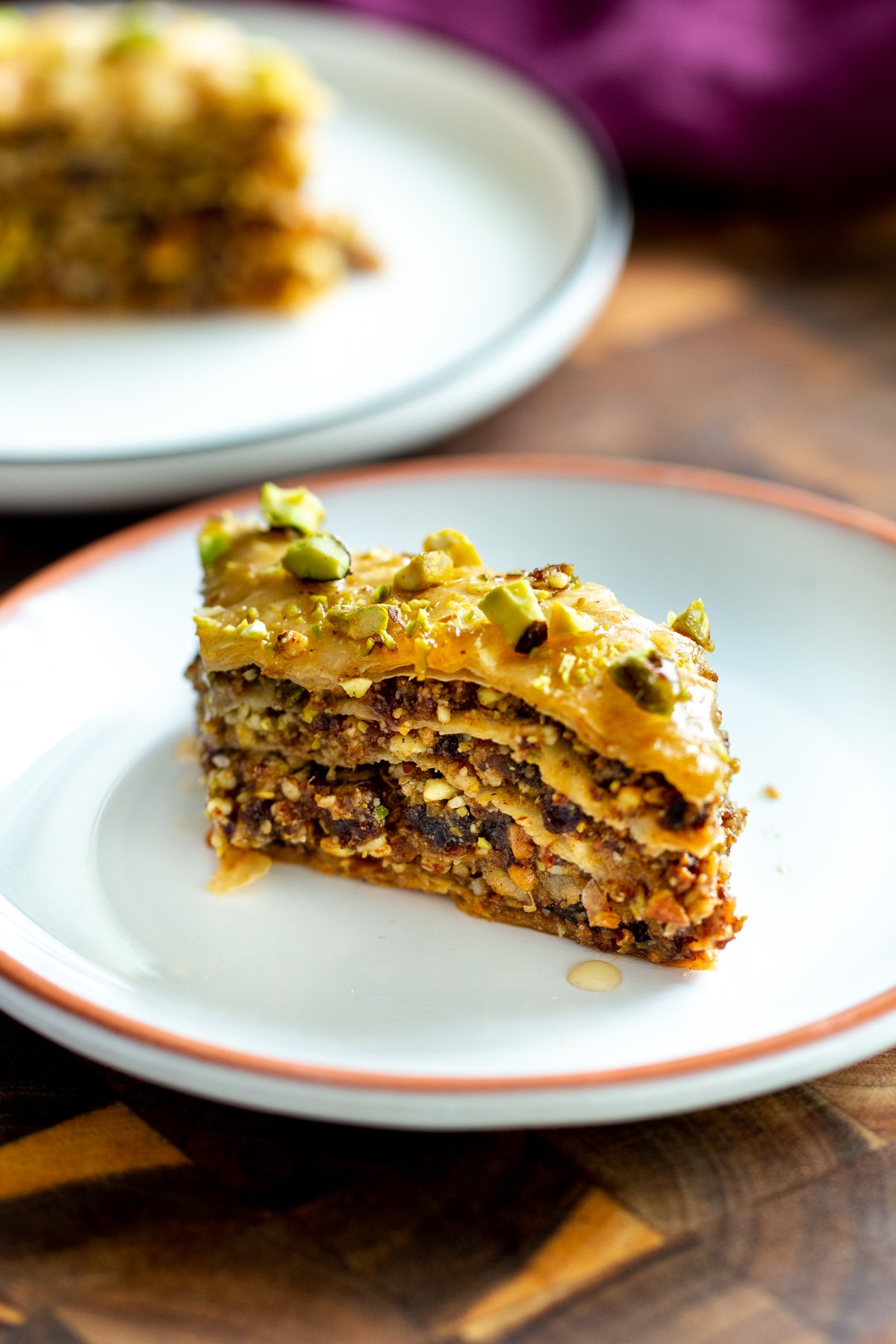 a small piece of vegan baklava on a small dessert plate