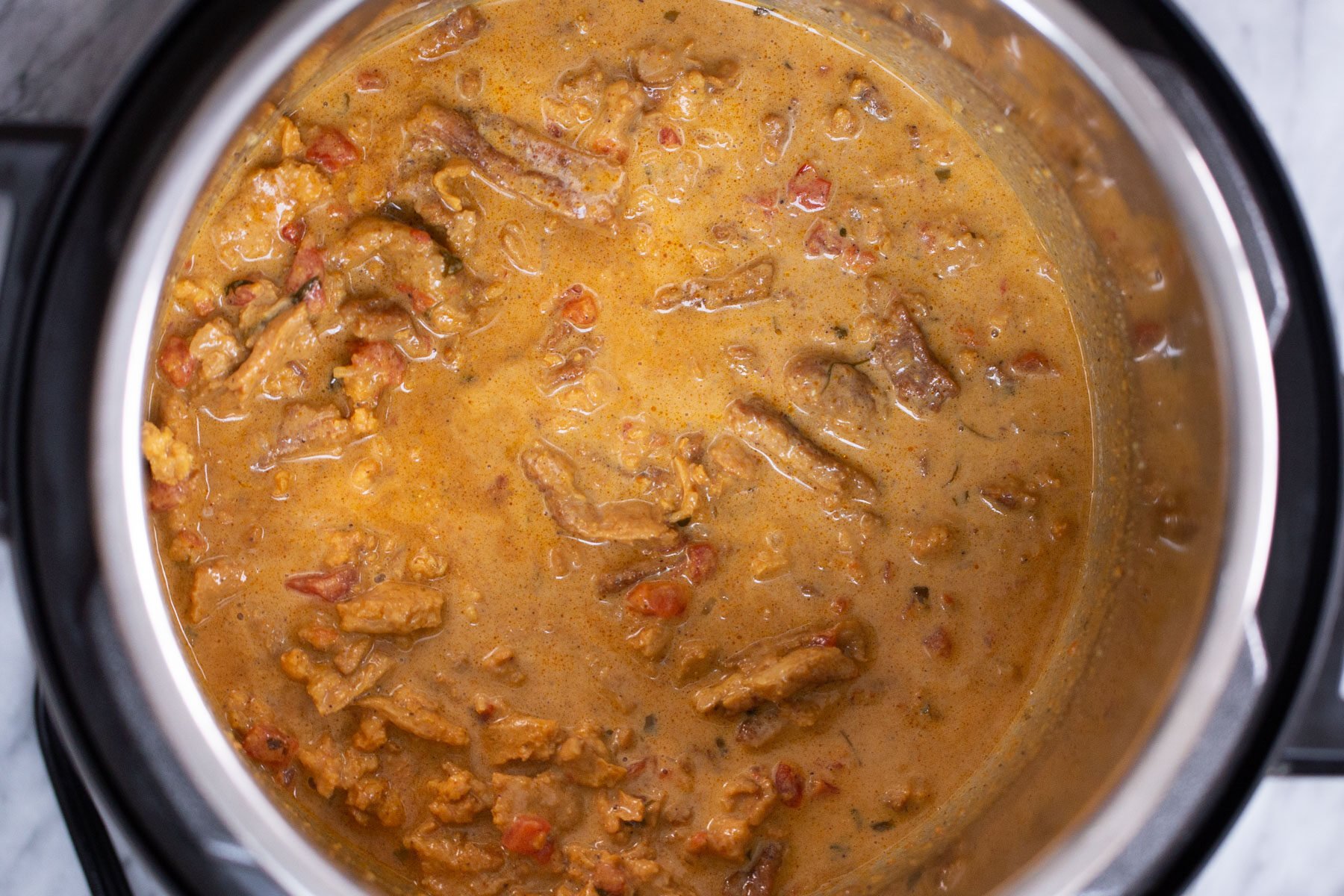 overhead shot of an Instant Pot with soycurl curry