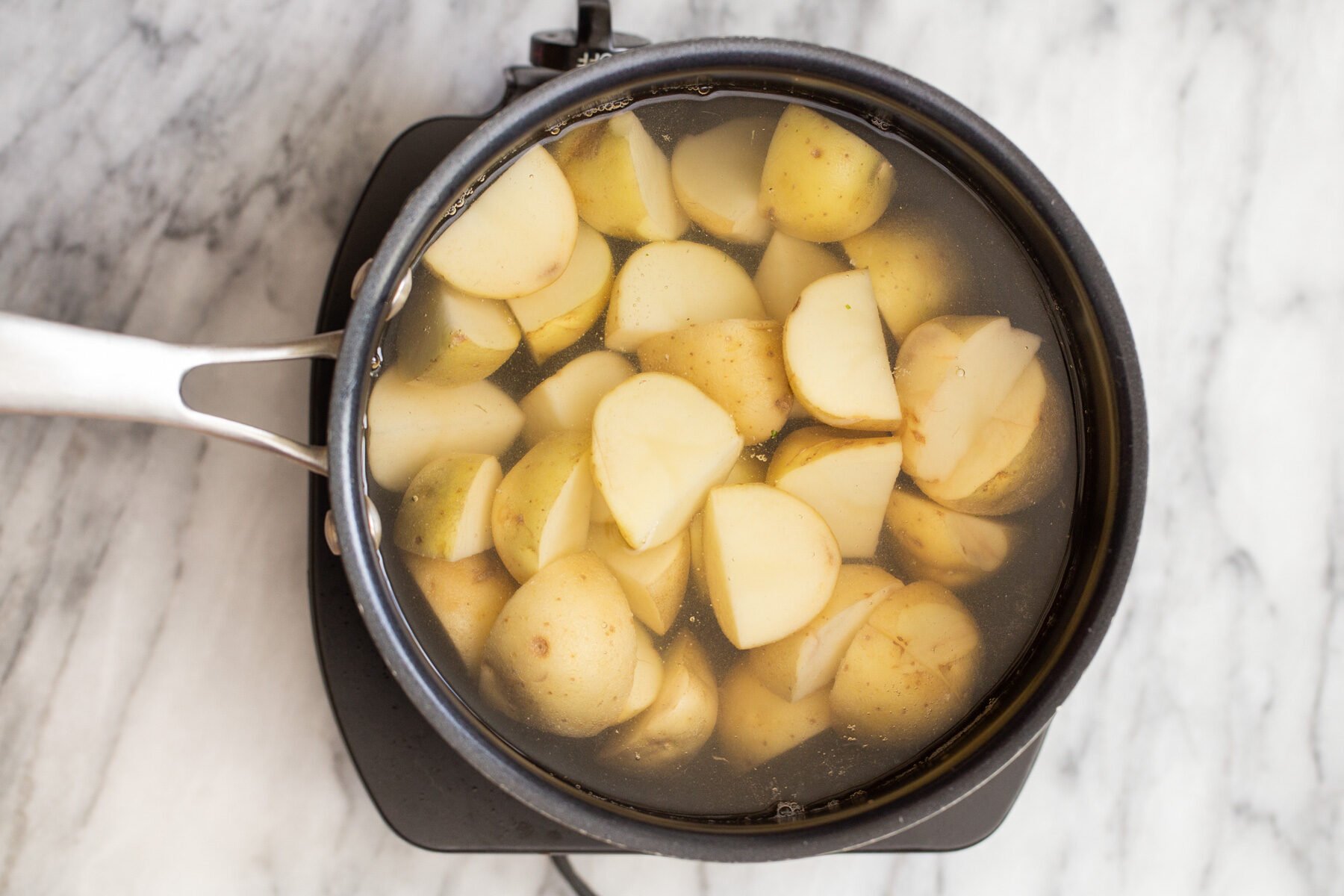 potatoes boiling in water