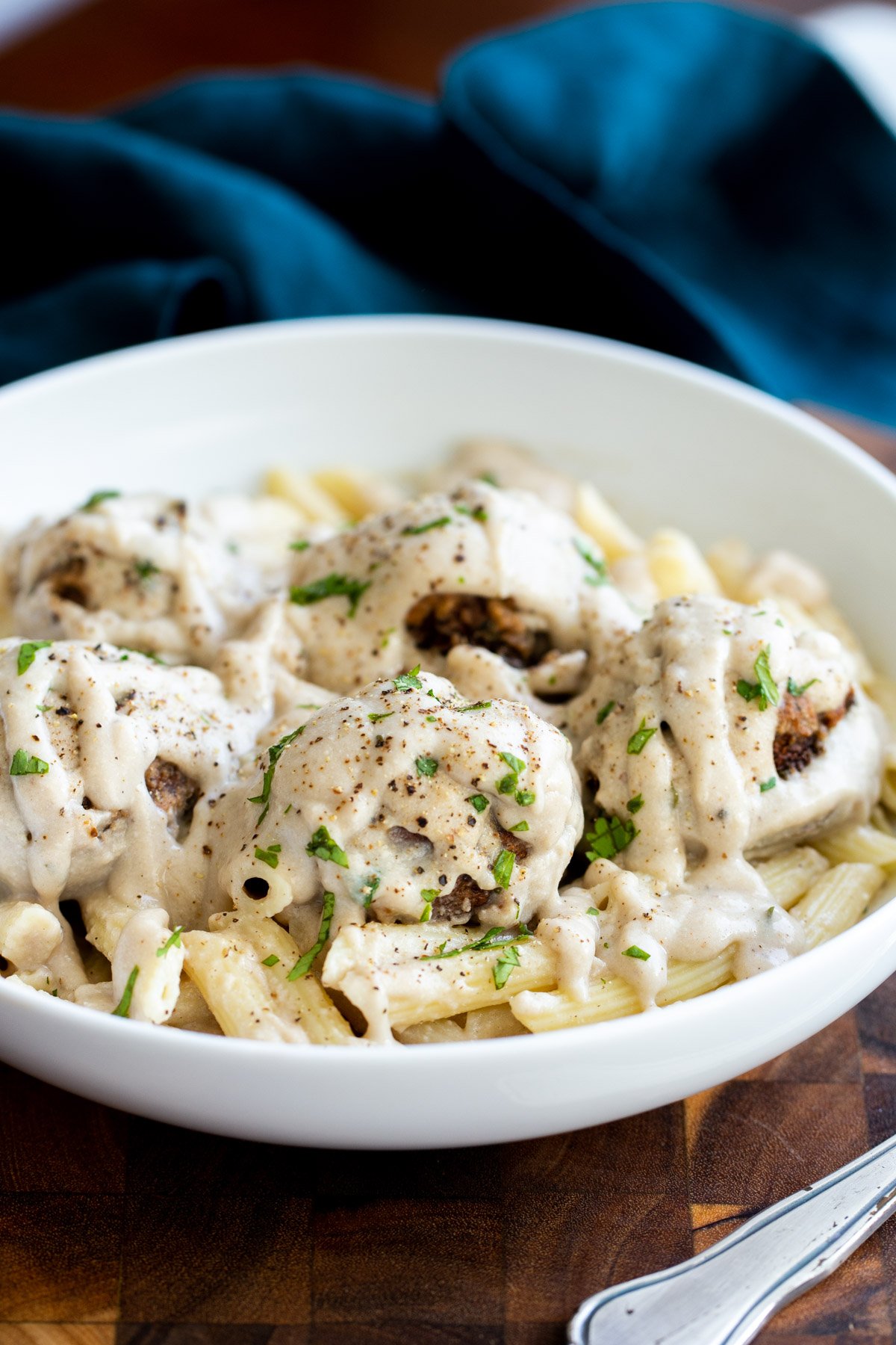 vegan swedish mushroom meatballs served over pasta