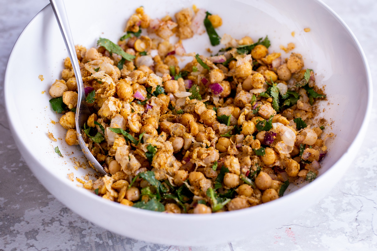 vegan curried chickpea salad in a white bowl