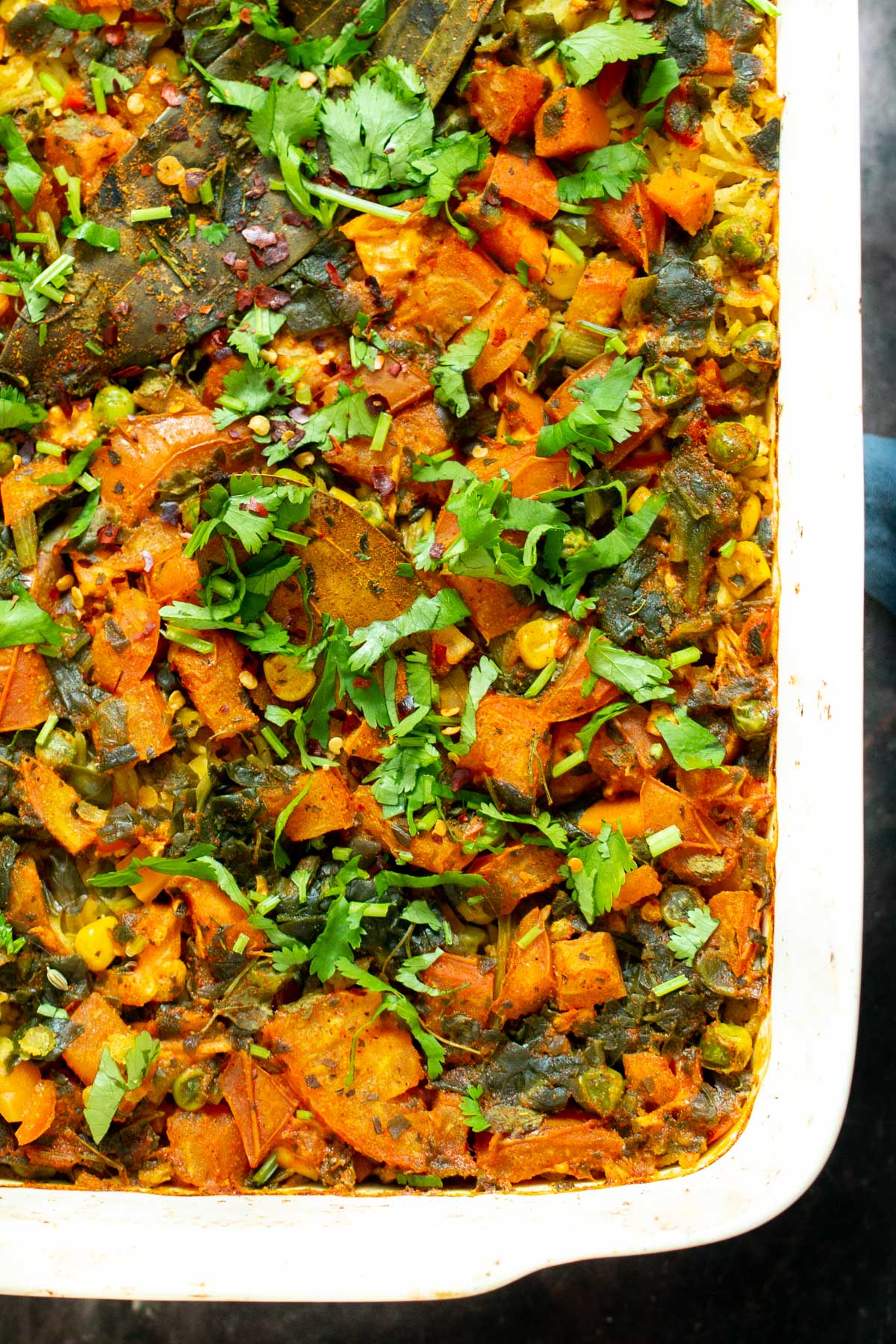 freshly baked vegan lentil rice casserole sprinkled with cilantro