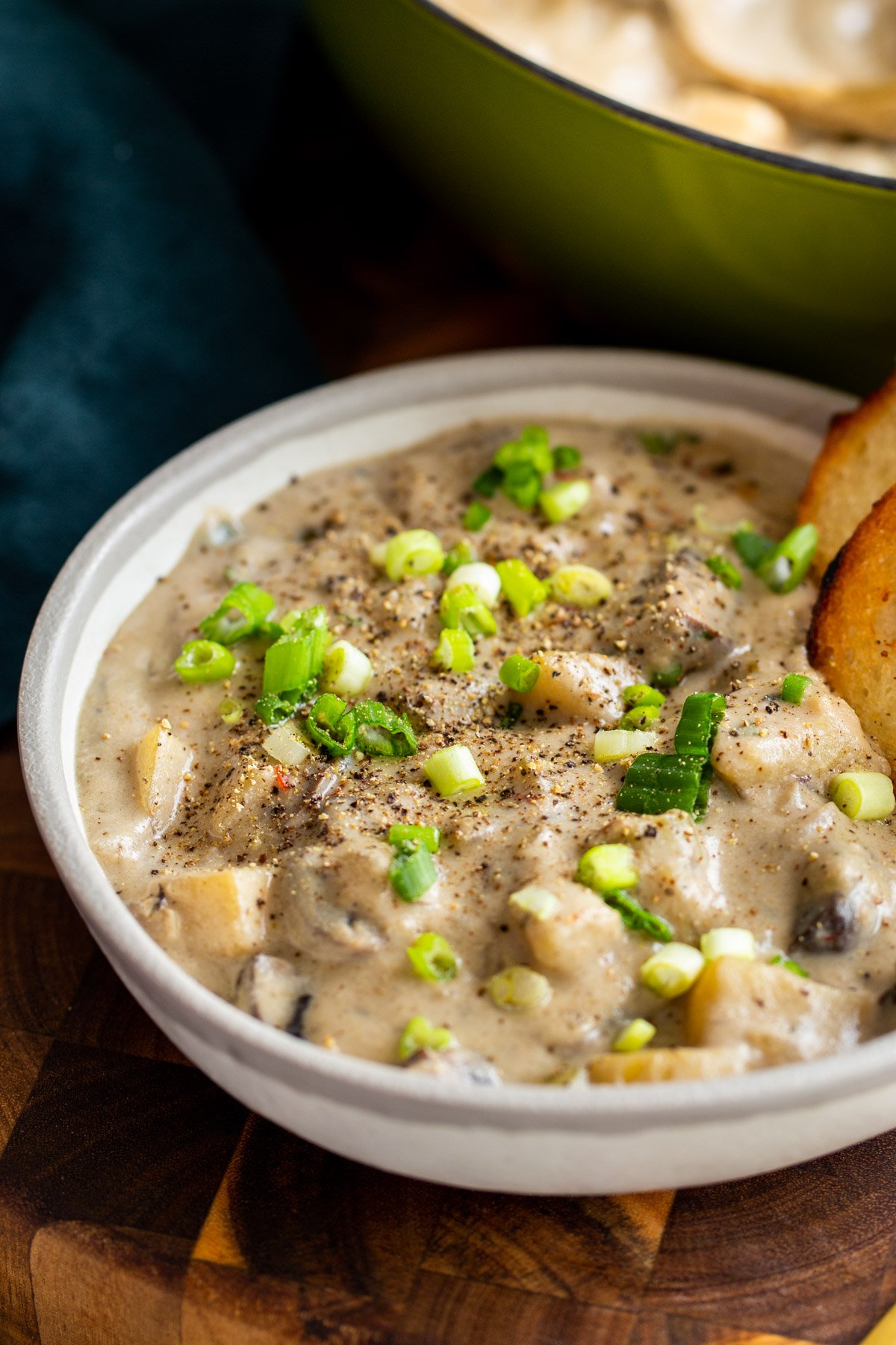 side view of a plate of vegan mushroom chowder