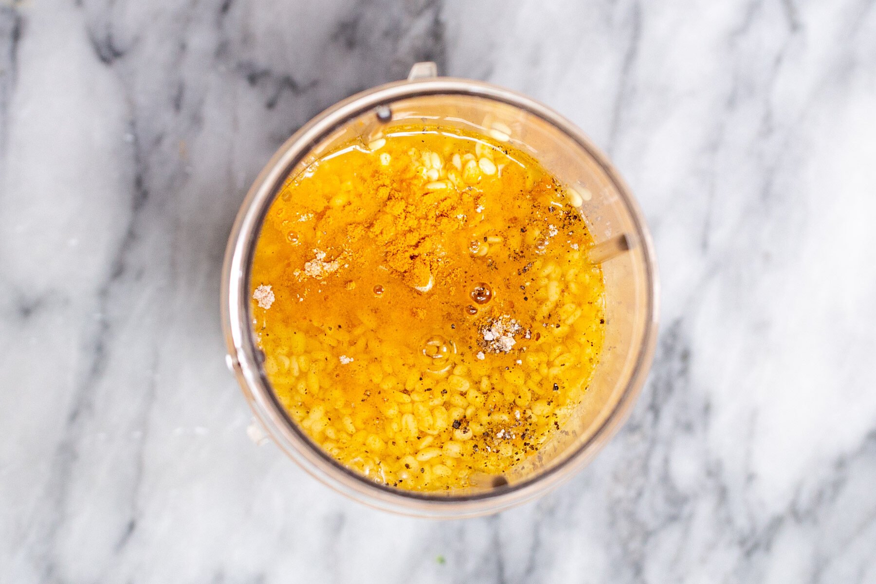 moong daal in a blender with water and spices