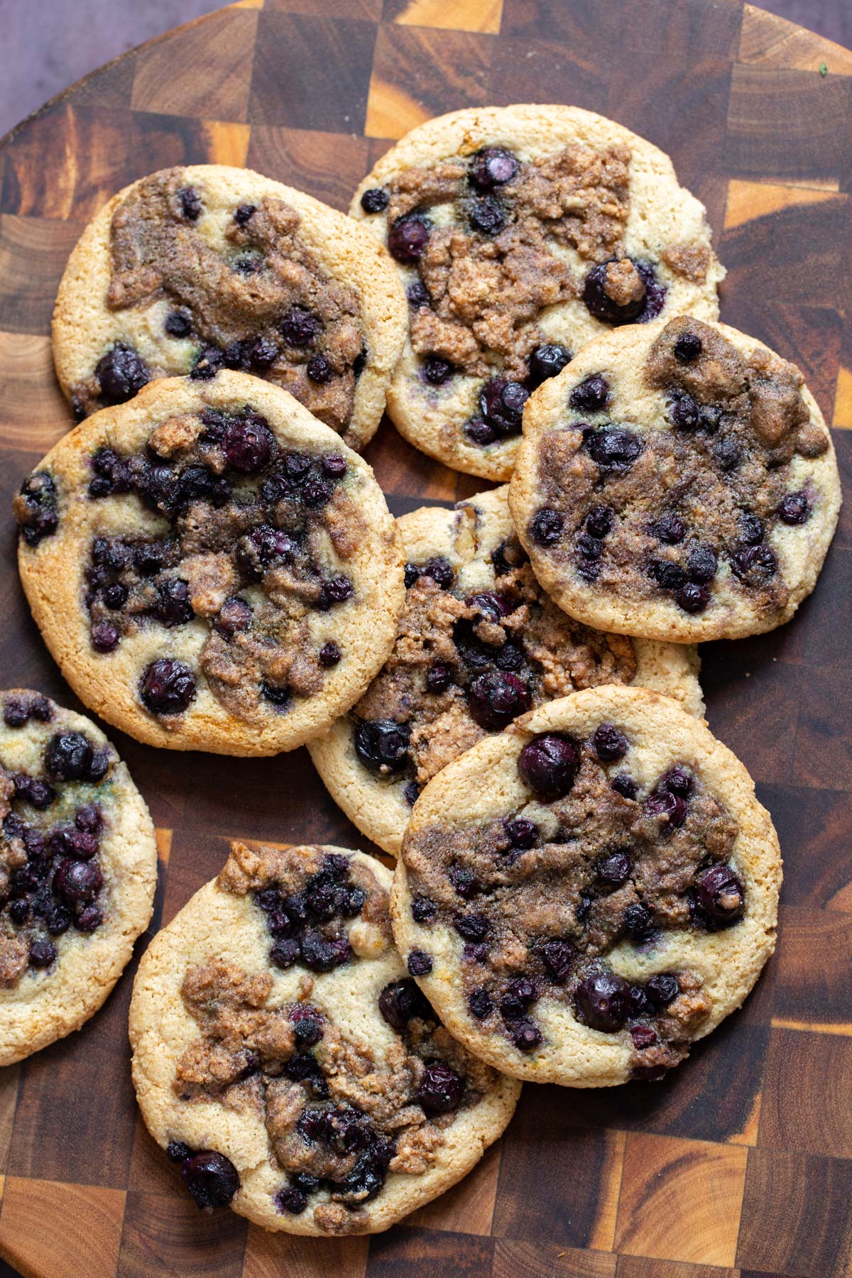 overhead shot of blueberry muffin cookies on a chopping board