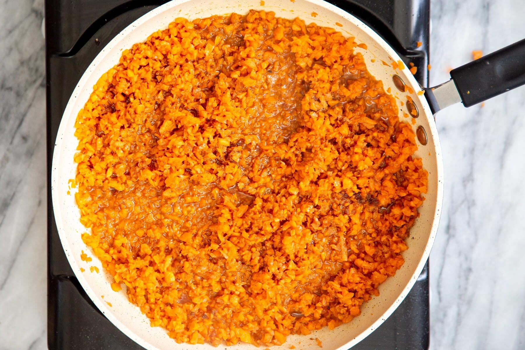 caramelized carrots in a sauteeing pan