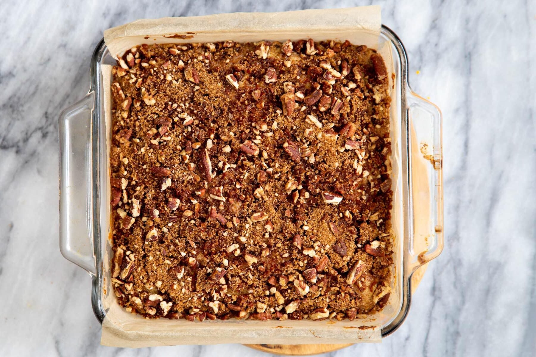 carrot cake bars with cinnamon sugar streusel in a pyrex dish