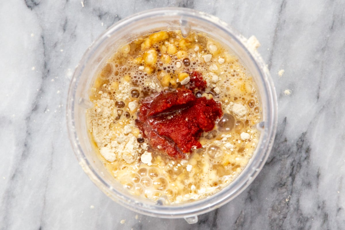 ingredients for vegan pepperoni in a blender container