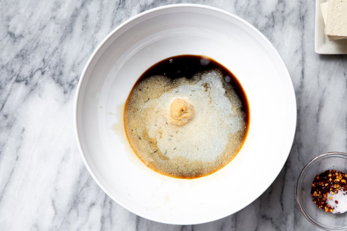 a small bowl with vegan tofu marinade
