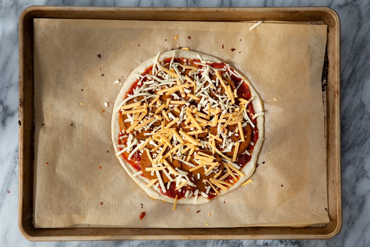 vegan grainfree almond flour pizza ready for baking