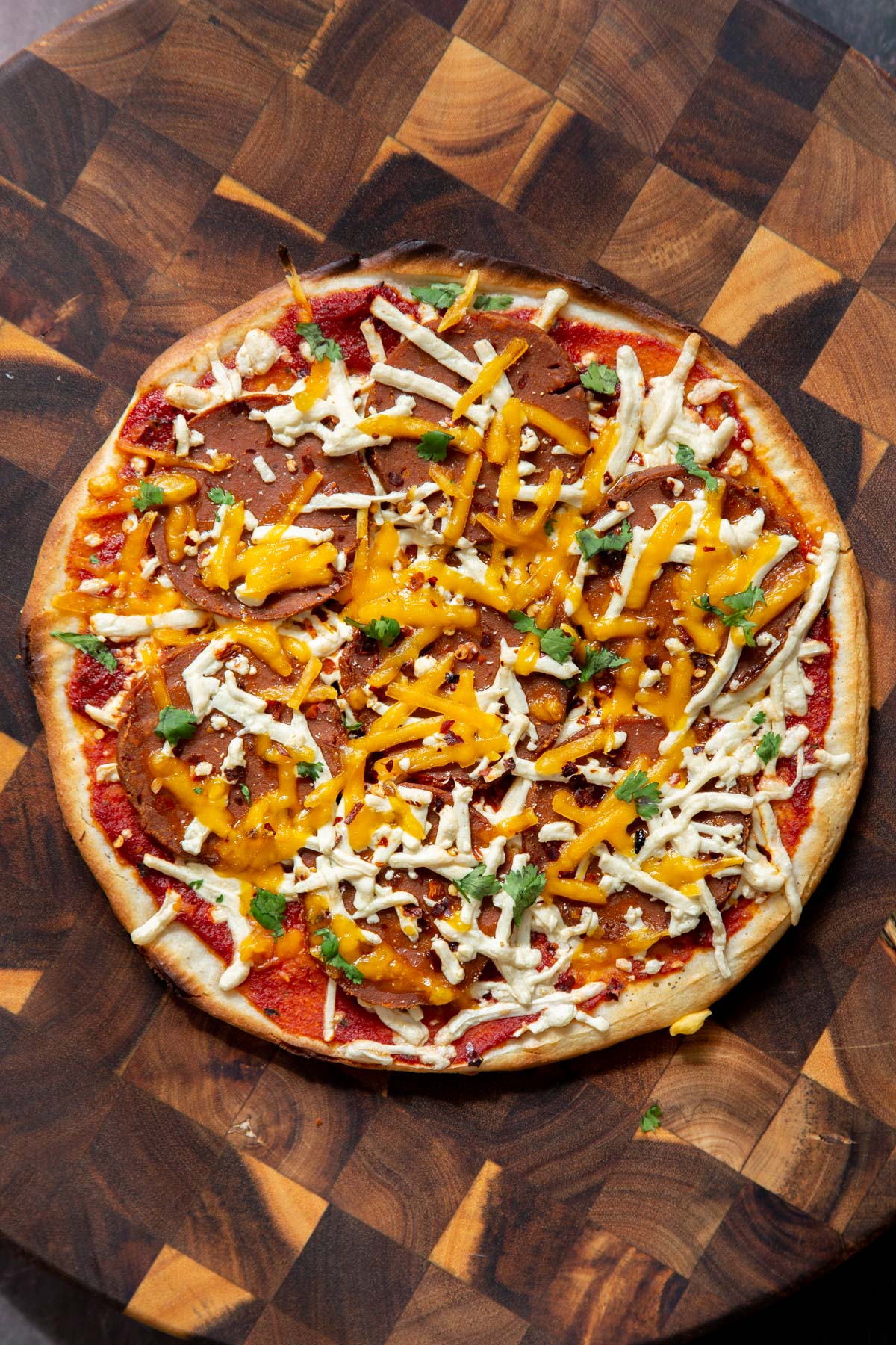 a vegan pepperoni pizza made with glutenfree almond flour pizza crust