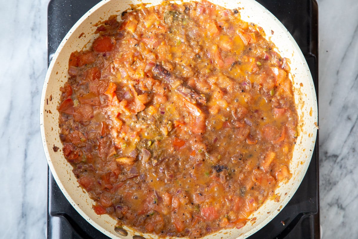 Indian tomato gravy in a frying pan
