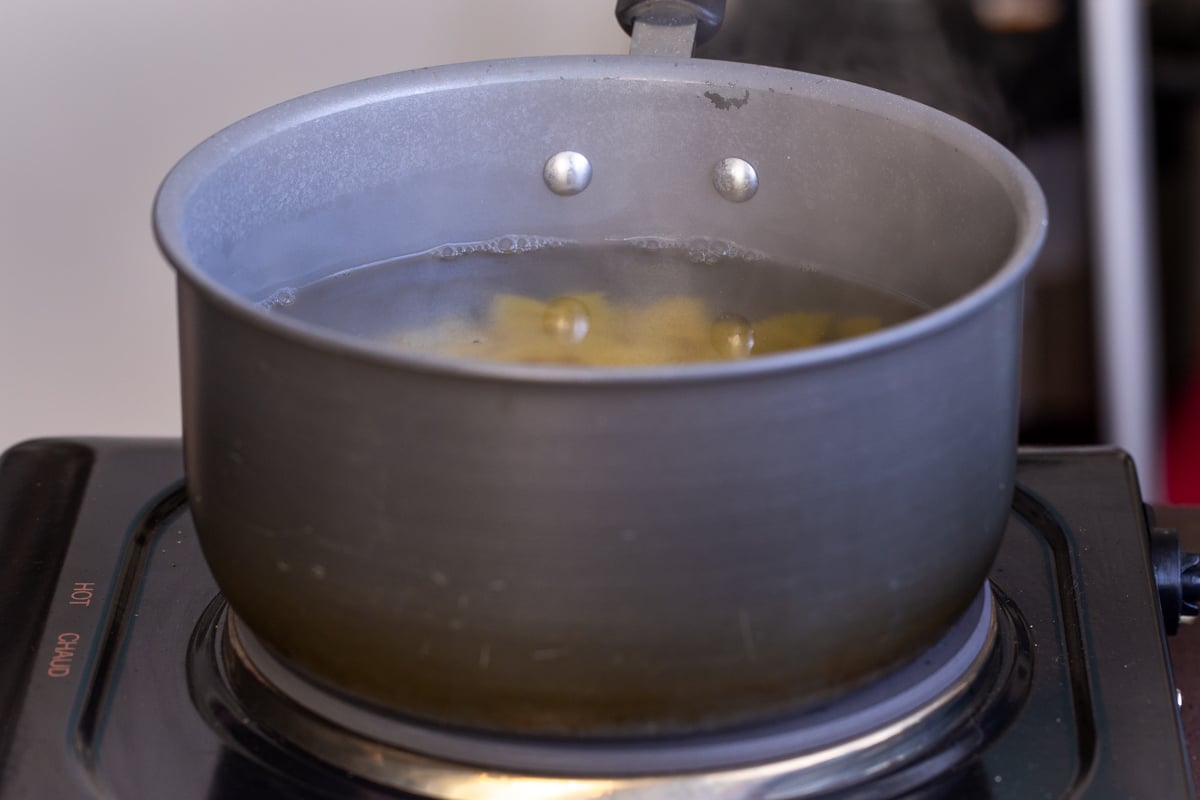 farfalle pasta boiling in a pot of water