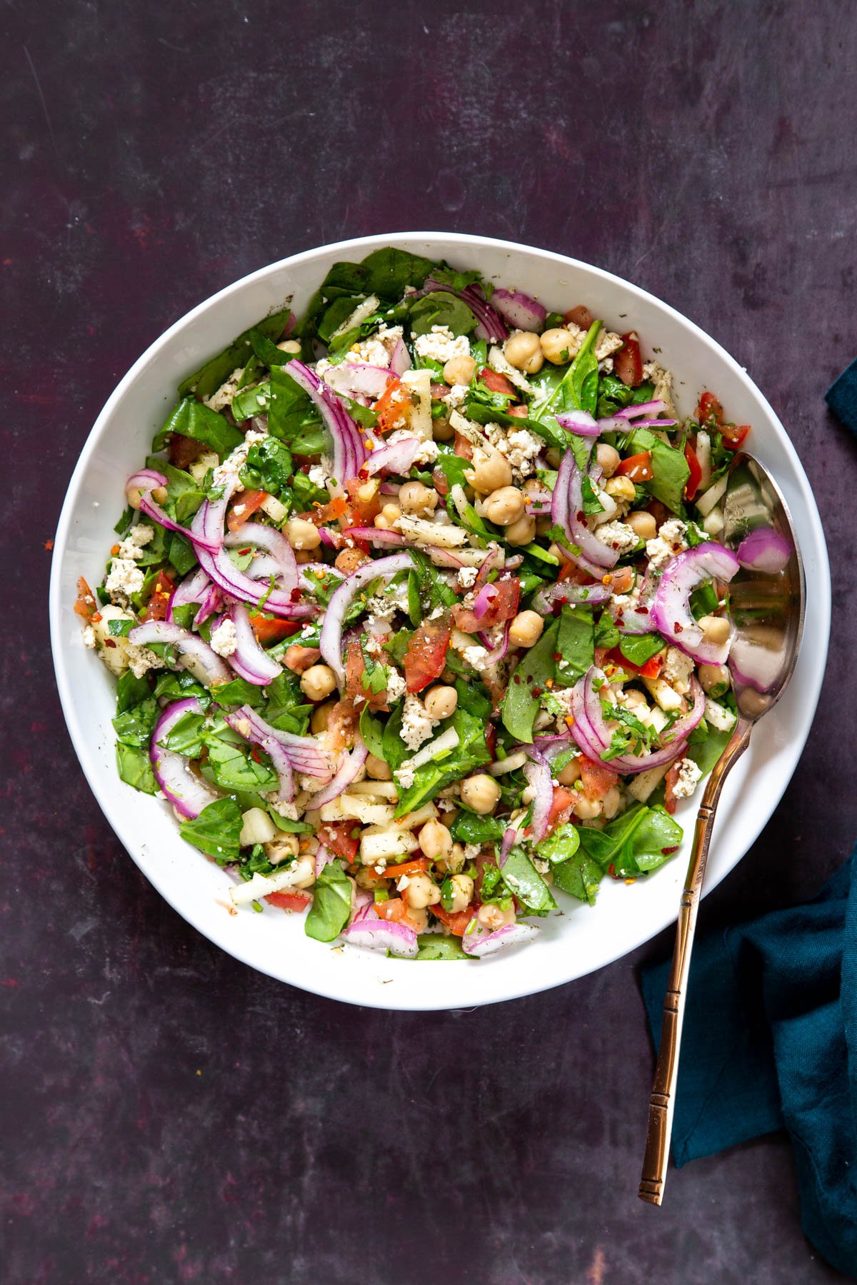 a bowl with healthy chickpea salad with lemon dill dressing