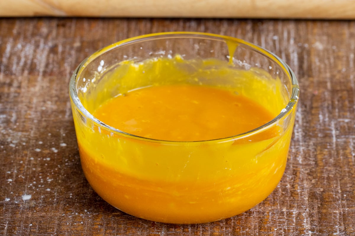 mango drizzle in a glass bowl