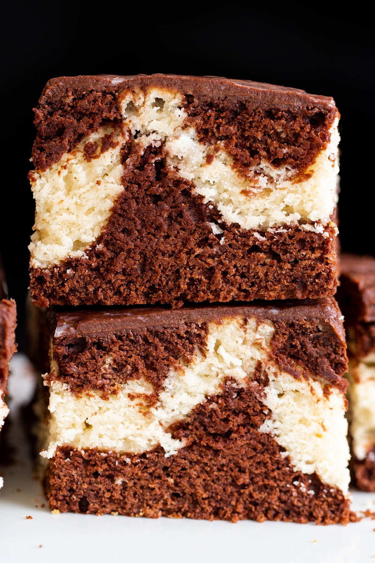 two stacked squares of vegan mocha marble cake