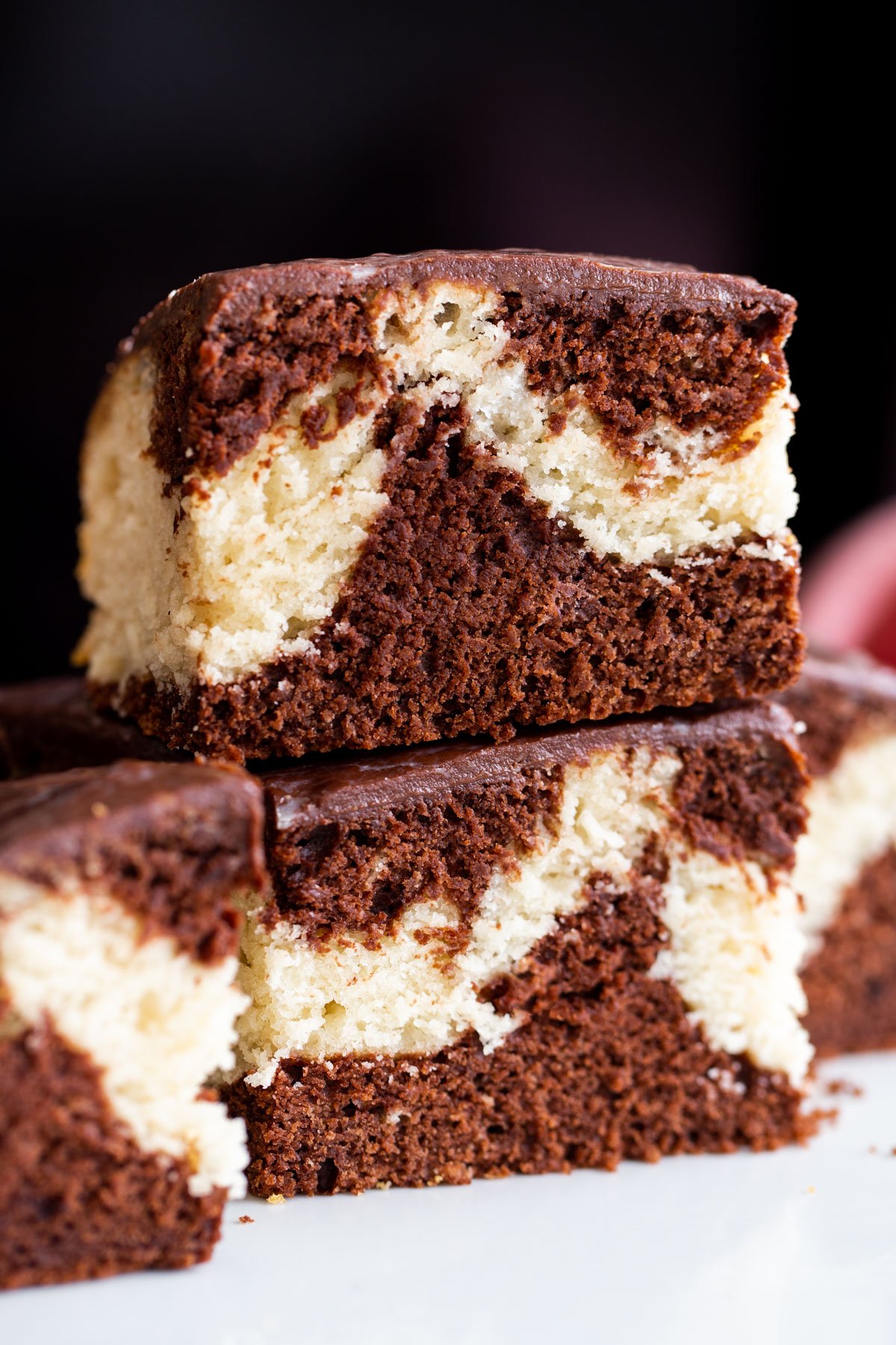 two stacked slices of vegan mocha marble cake