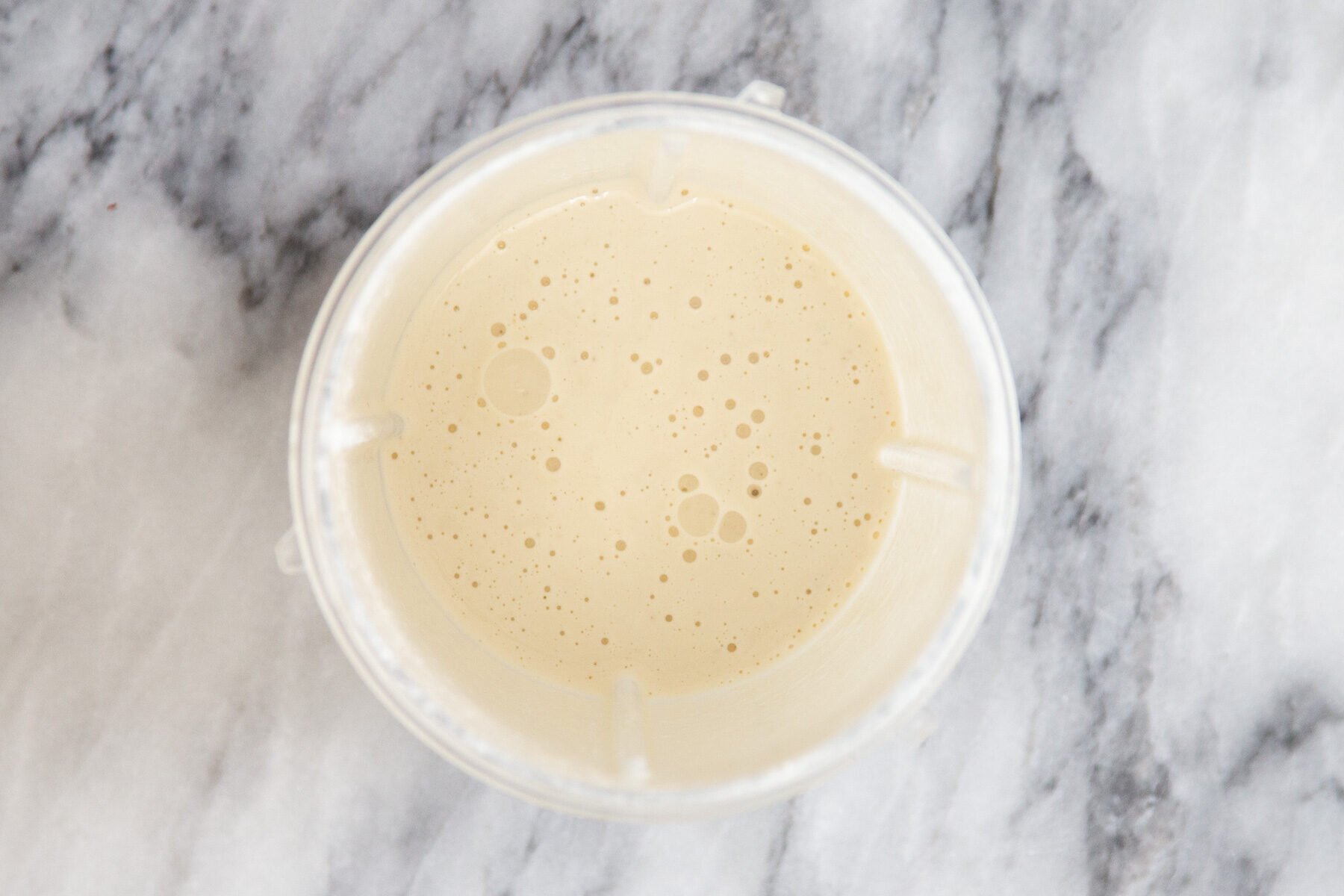 cashew cream in a small container
