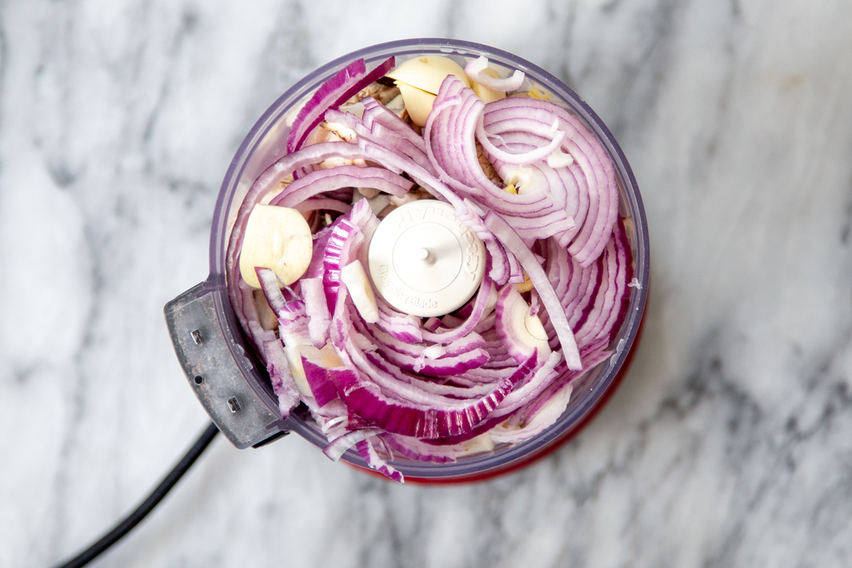onion, garlic and mushroom stems in a food processor