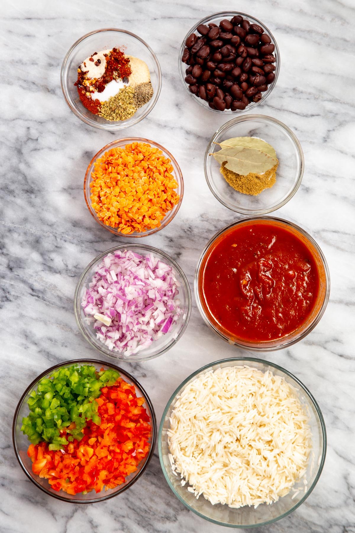 ingredients for vegan Mexican Tex Mex Casserole on a marble countertop