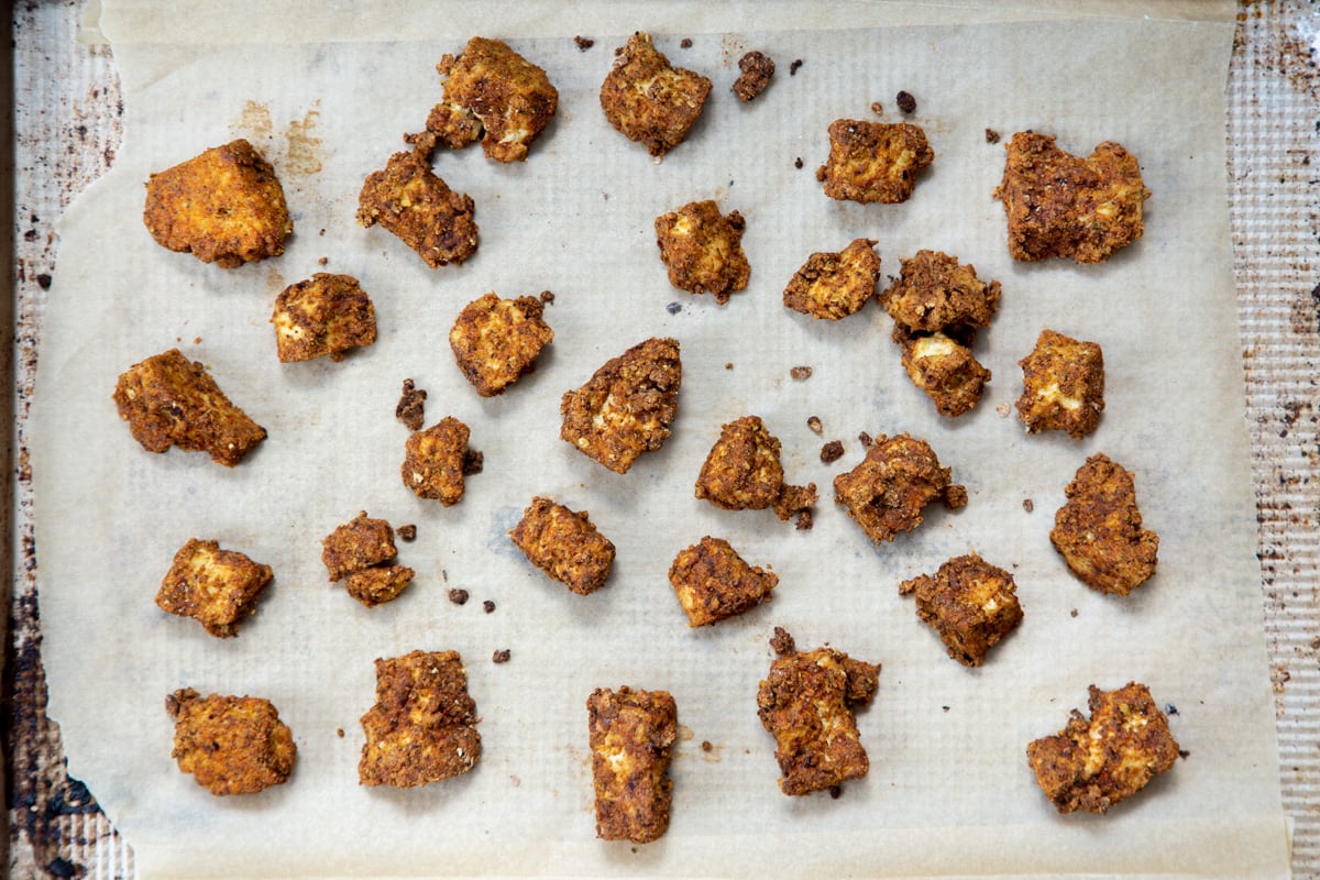 baked tofu nuggets on a sheet pan