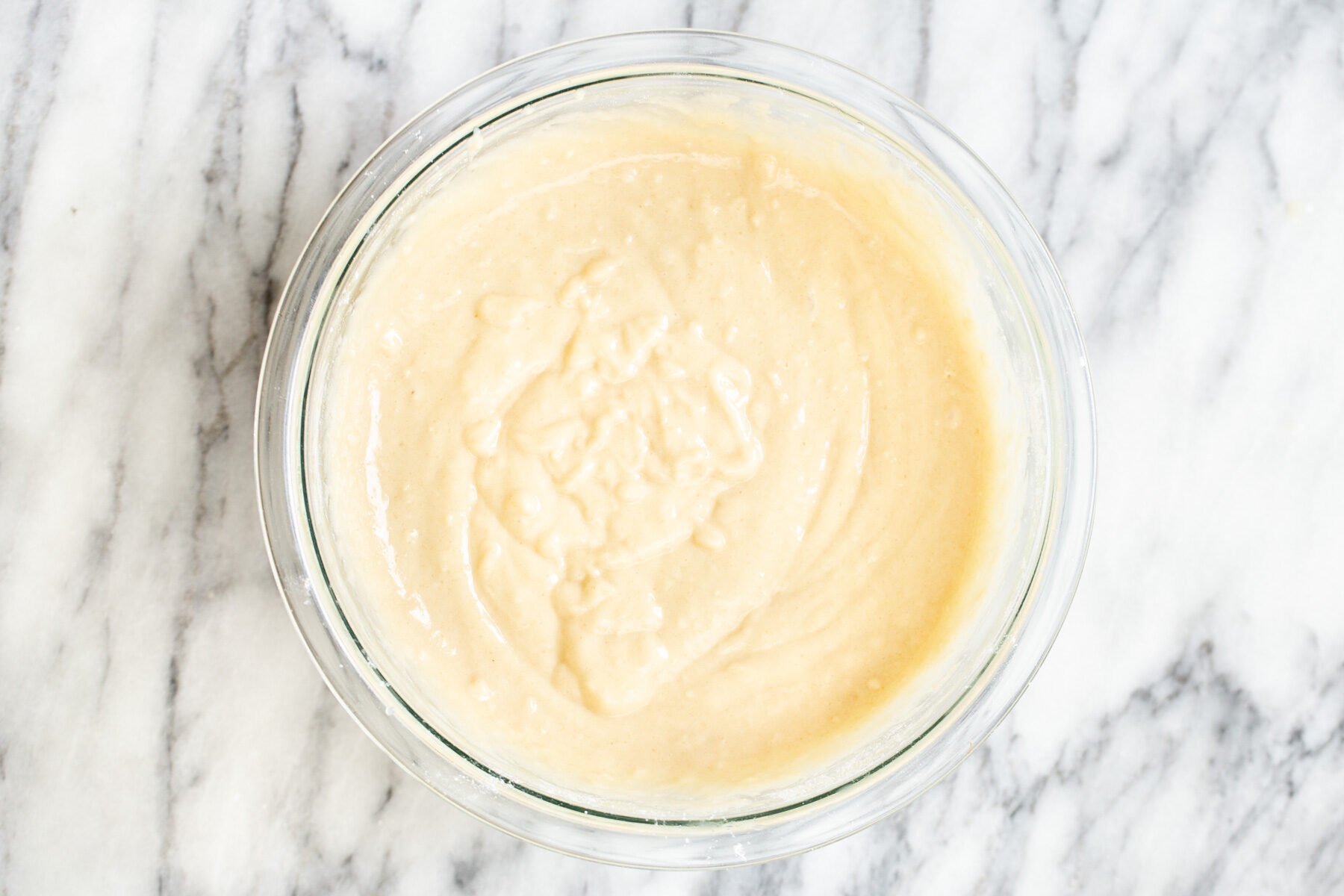vegan cake batter in a glass bowl
