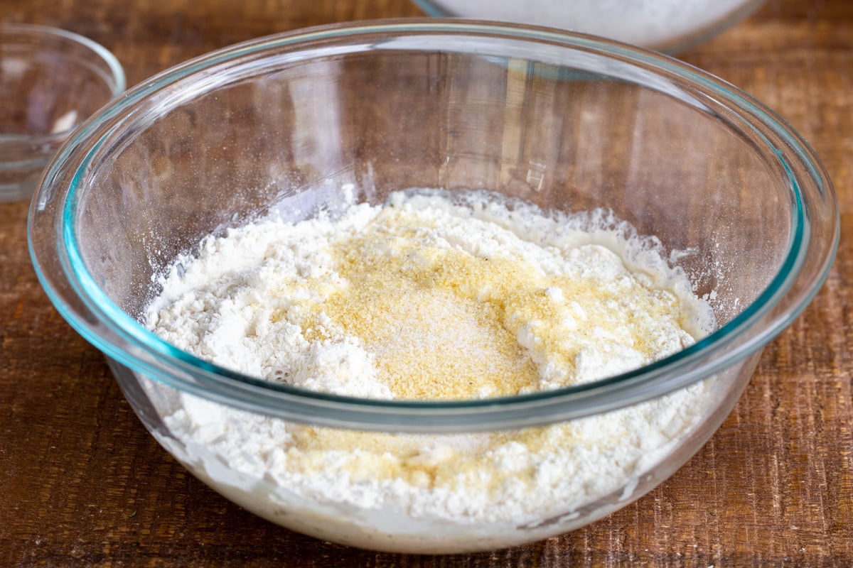 dry ingredients for pretzel crust pizza dough in a bowl