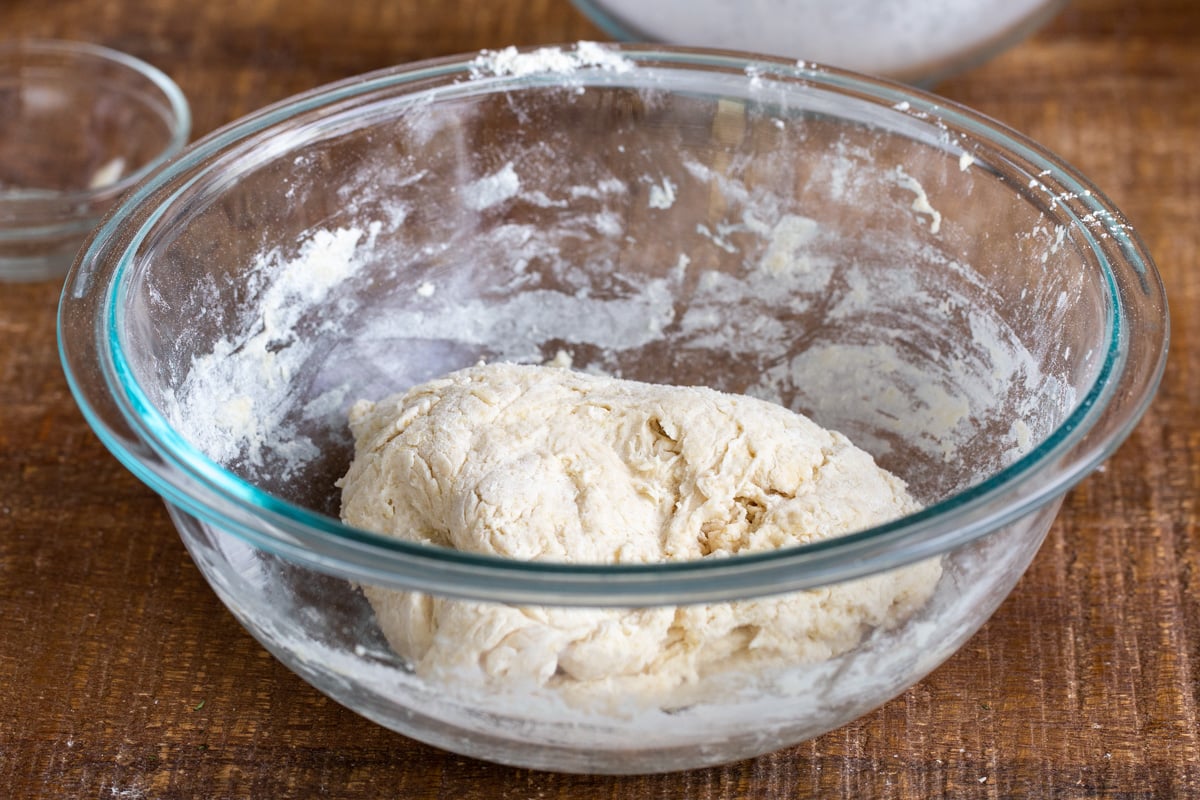 pretzel crust pizza dough in a glass bowl