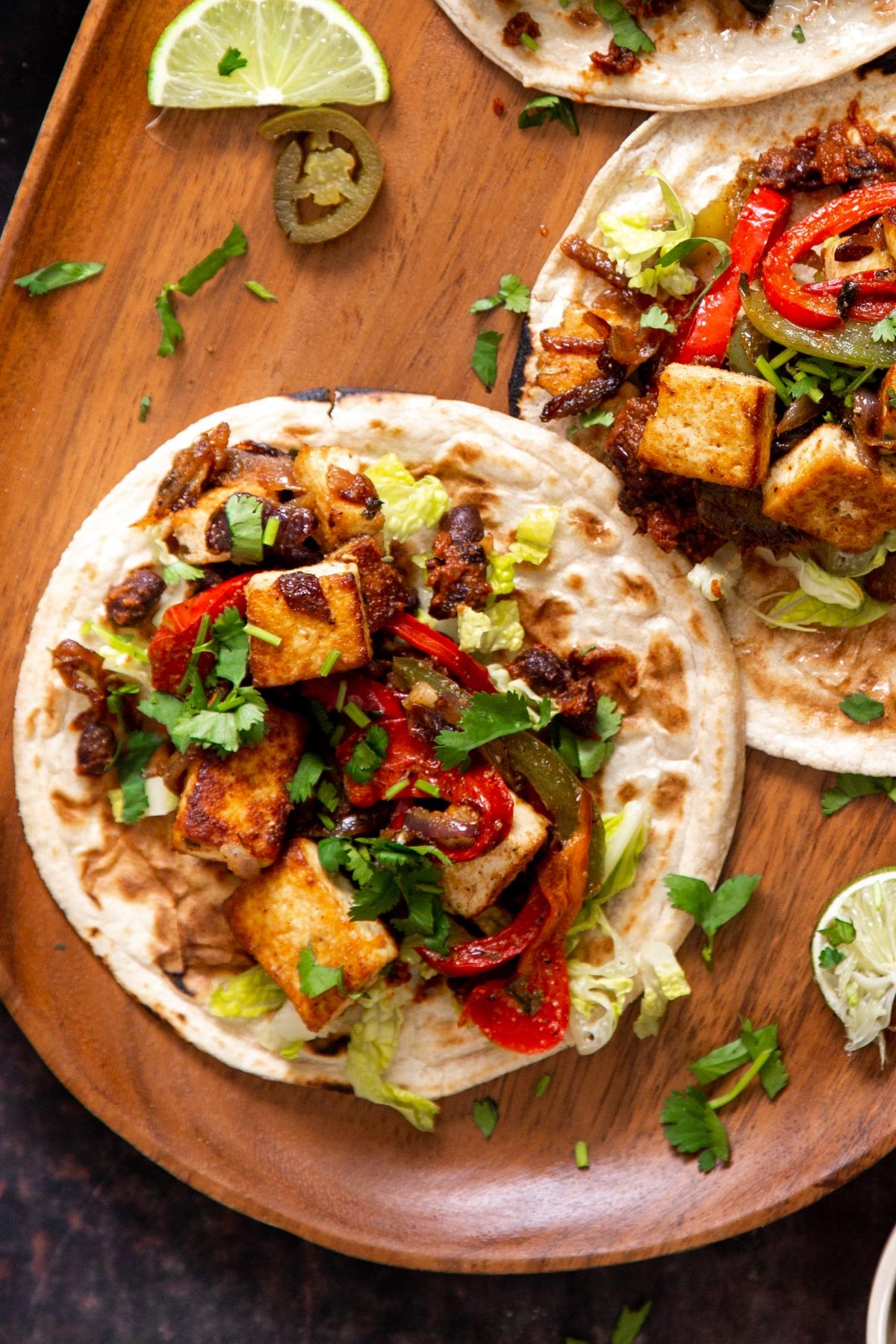 vegan tex mex tofu tacos with bell peppers and fresh cilantro