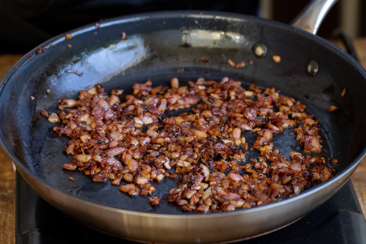 browned onions in a black skillet