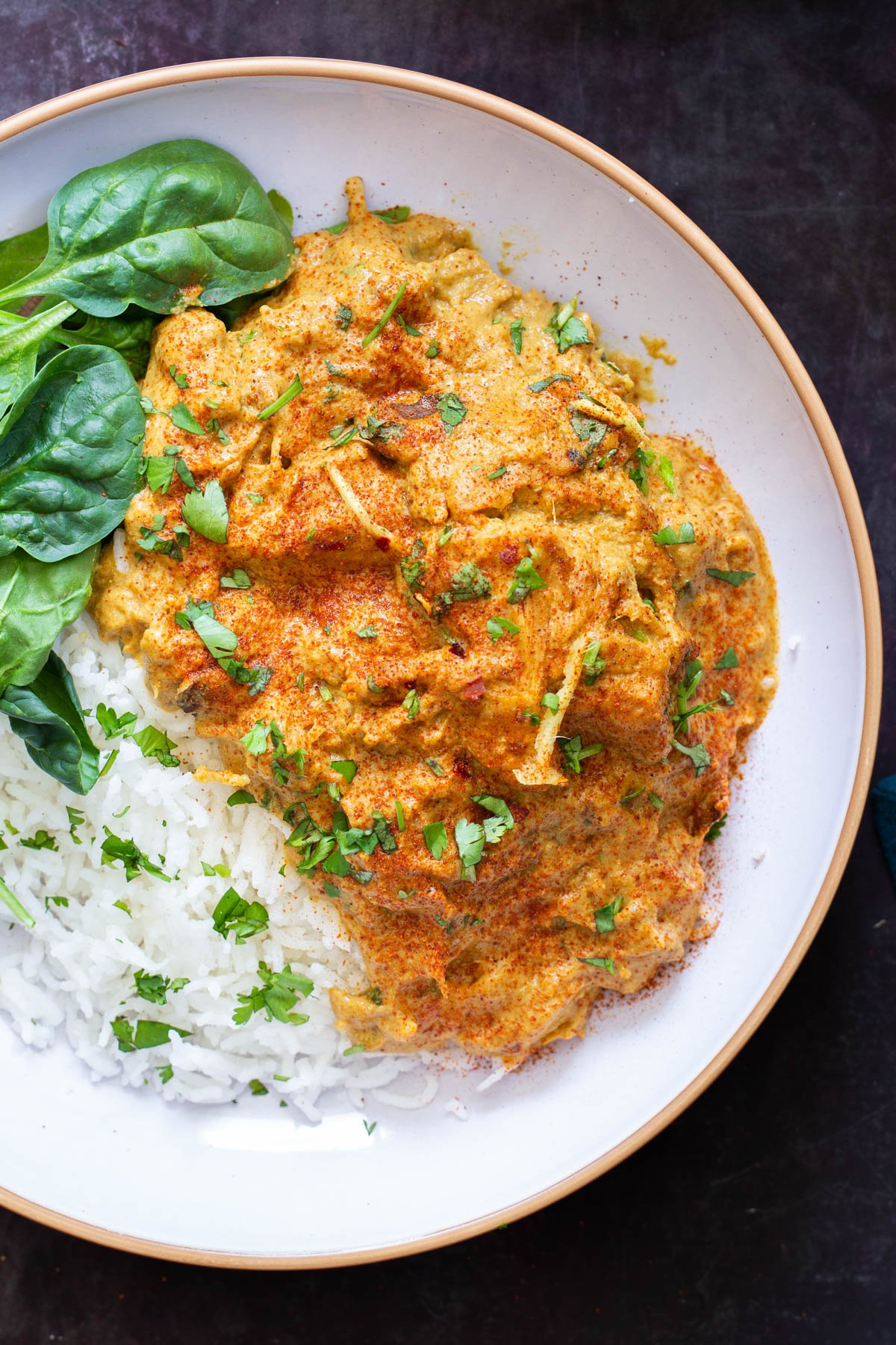 vegan jackfruit korma served with rice and spinach
