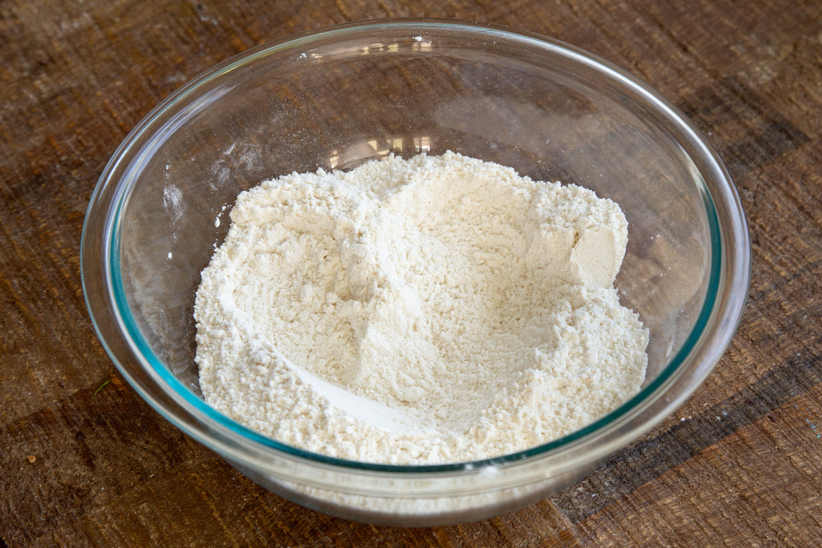 dry cake mix ingredients in a glass bowl