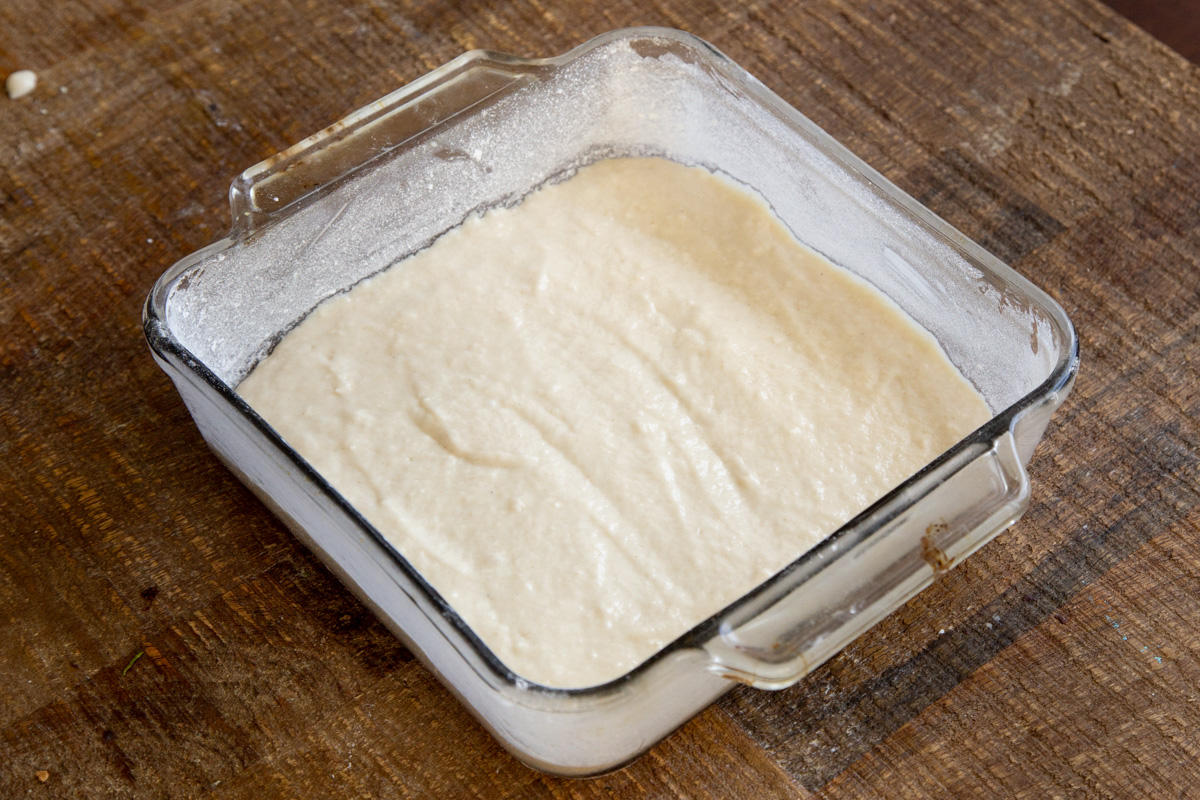 vegan cake batter in a brownie pan