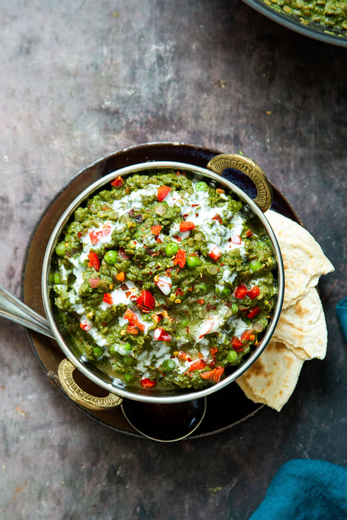 a traditional Indian dish with vegan green keema served with a side of flatbread