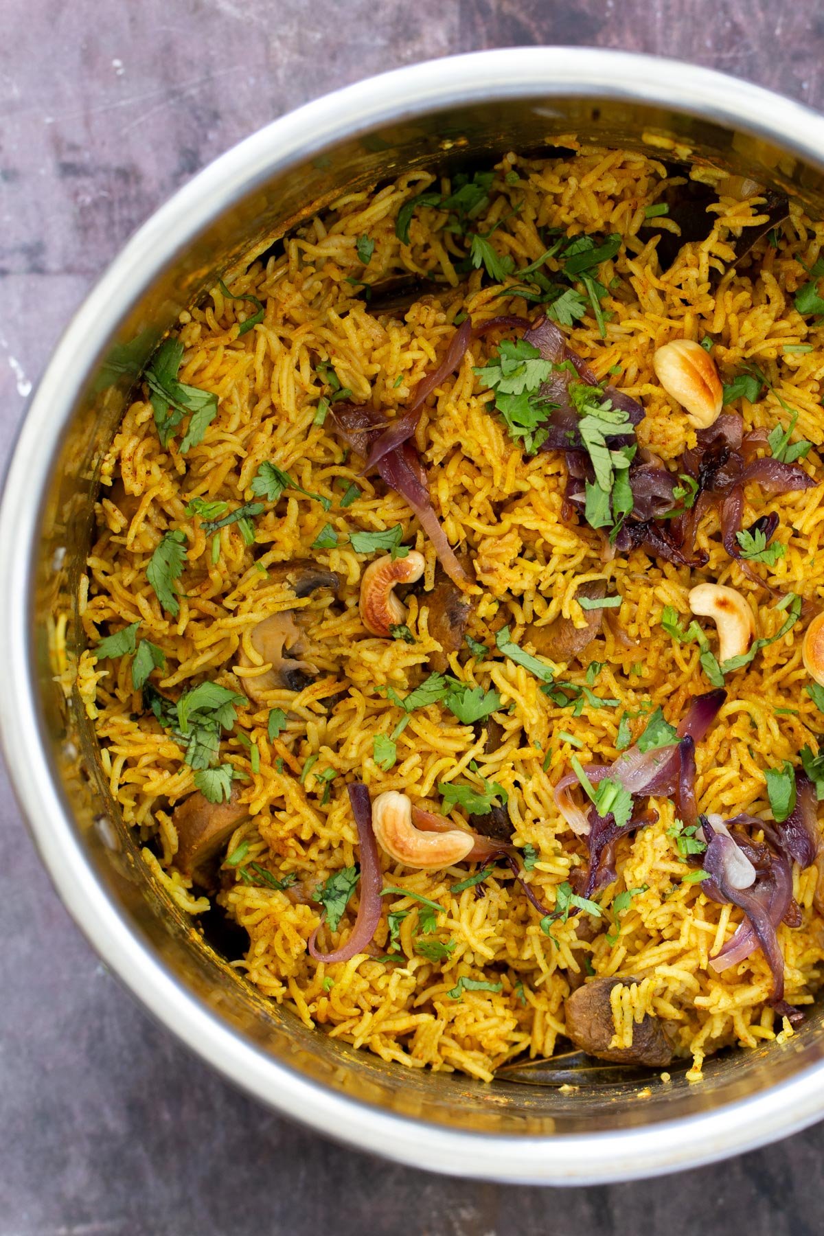 vegan mushroom biryani sprinkled with cilantro in an Instant Pot