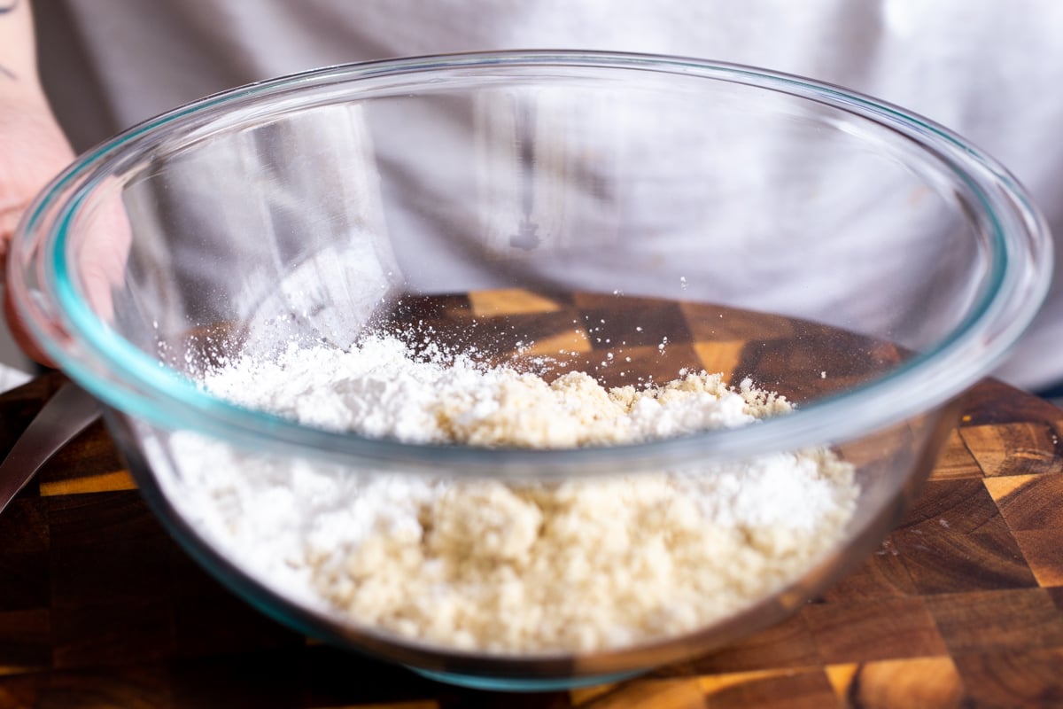 a glass bowl with almond flour and tapioca starch