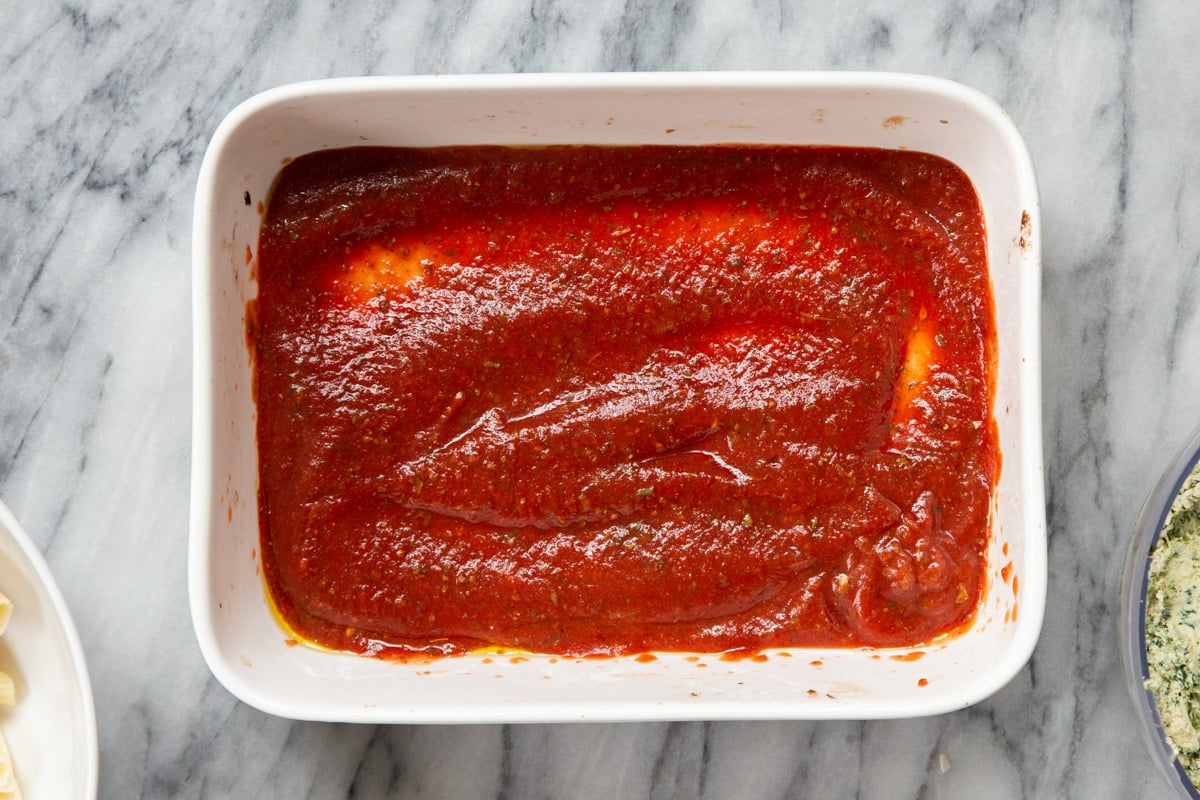 marinara sauce in a white casserole dish