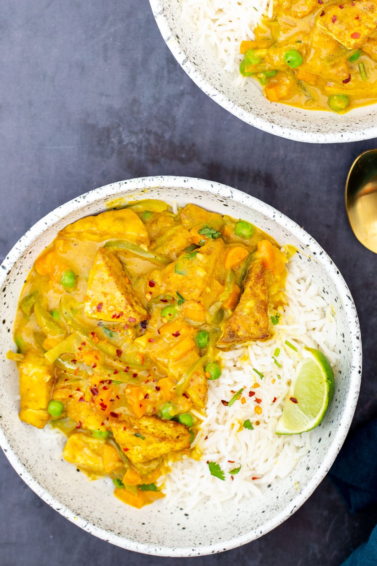 Malaysian Coconut curry with crispy tofu served with a side of rice
