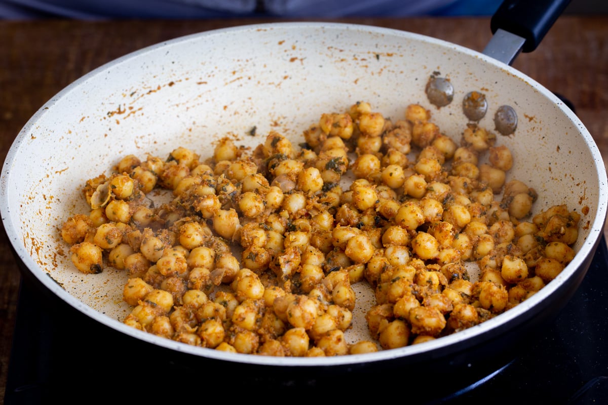 spiced chickpeas in a sauteeing pan