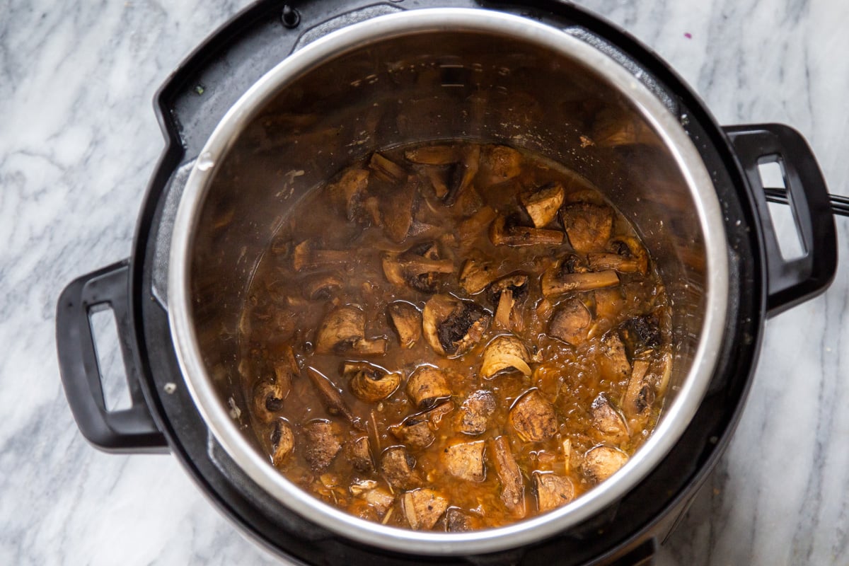 garlic mushrooms sauteeing in an Instant Pot