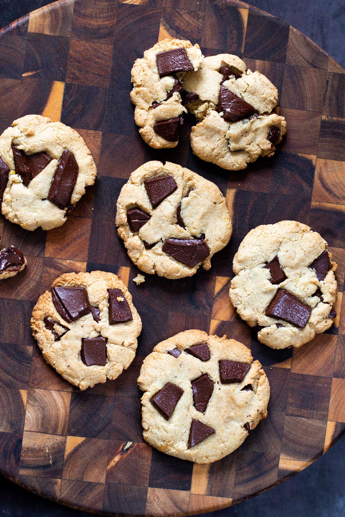 miso chocolate chunk cookies on a wooden chopping board