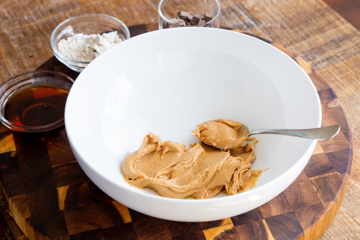 peanut butter in a bowl with a spoon