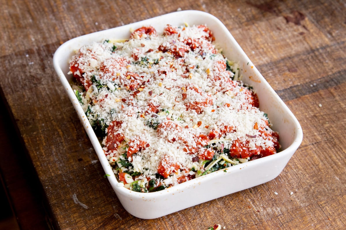 assembled tofu parmesan bake ready for the oven