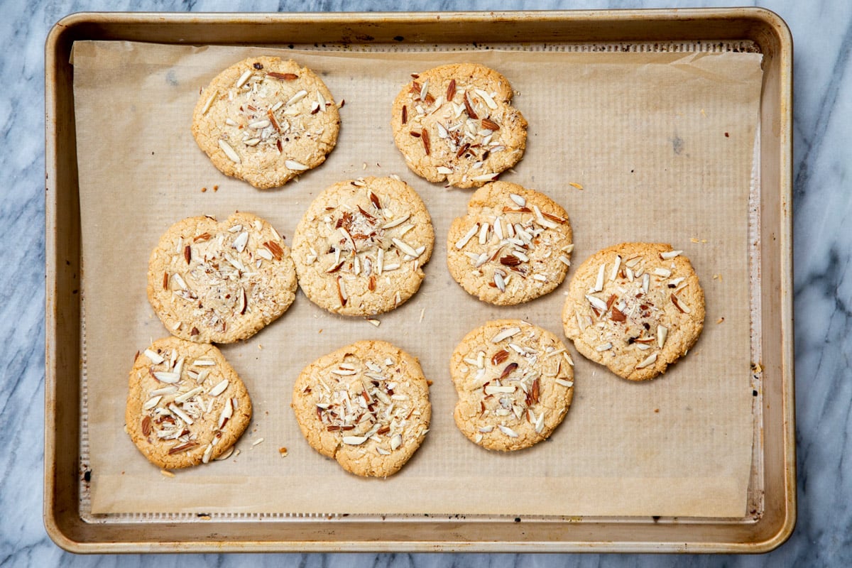 freshly baked vegan almond joy cookies on a sheet pan
