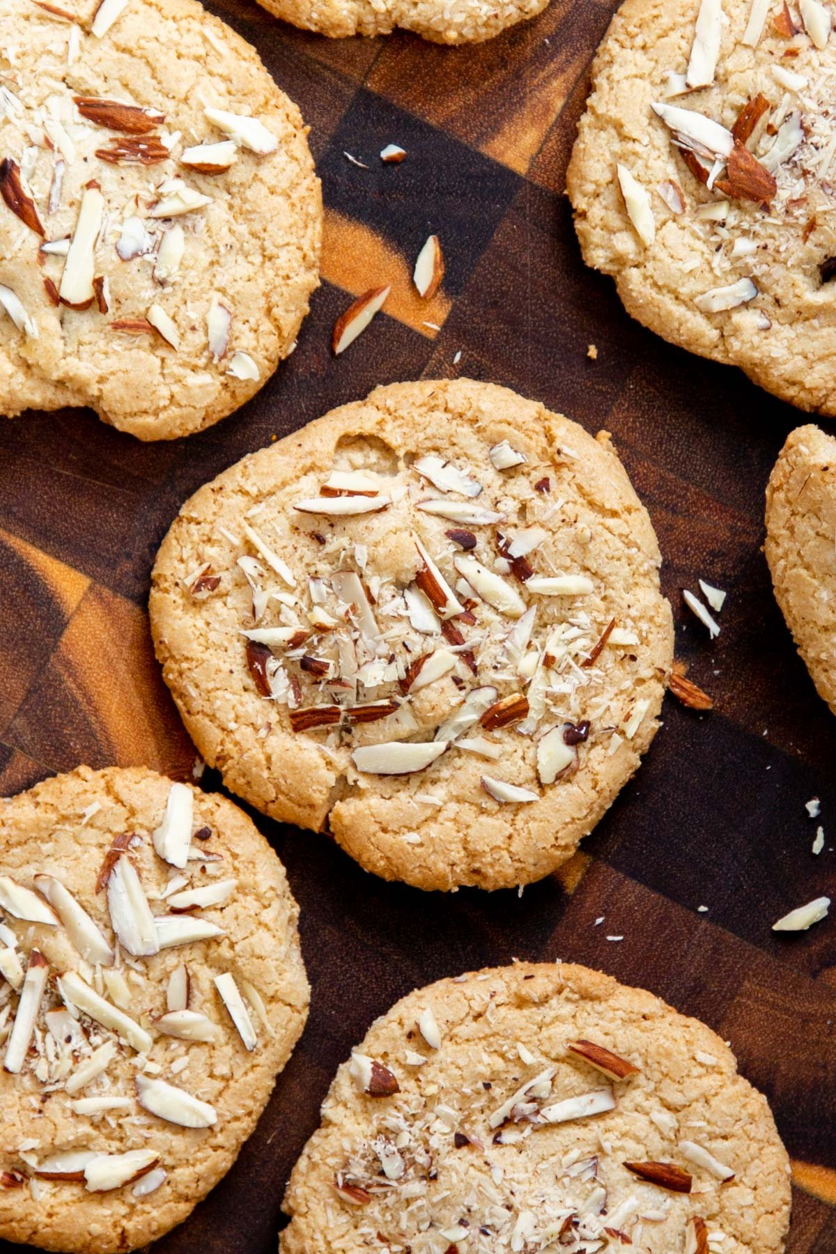 glutenfree vegan almond joy cookies on a wooden chopping board