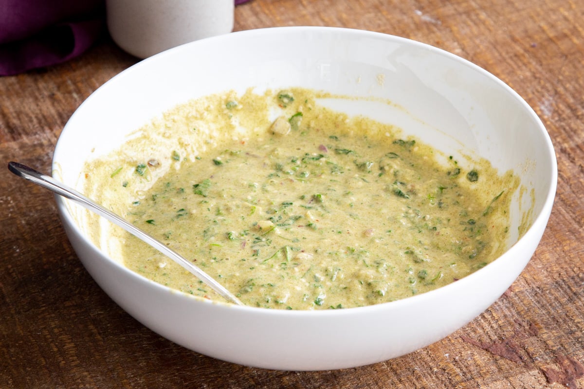 vegan lentil pancake batter in a white bowl