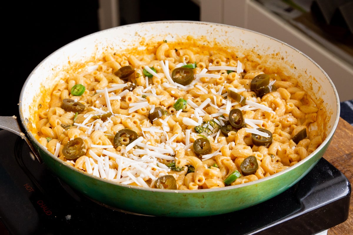 a skillet with vegan jalapeno mac and cheese
