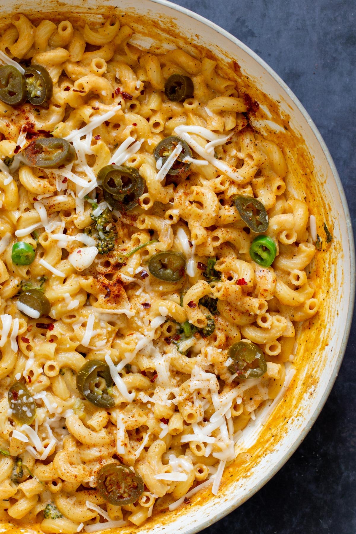 overhead shot of a skillet with vegan jalapeño mac and cheese