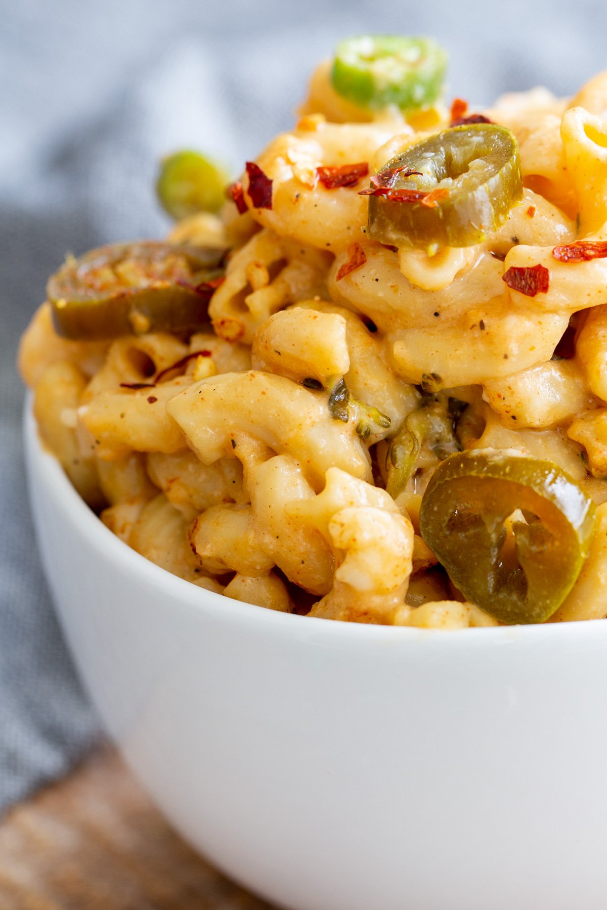 close-up of a serving of vegan Jalapeno mac and cheese in white bowl