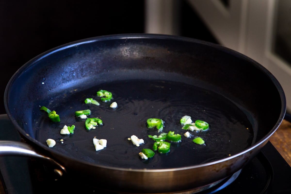 chili and garlic in a black skillet